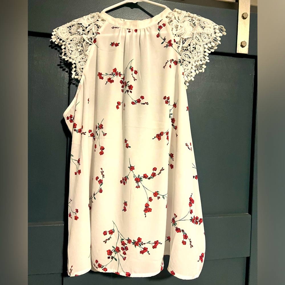Express white floral flowy top. Size XL open back.